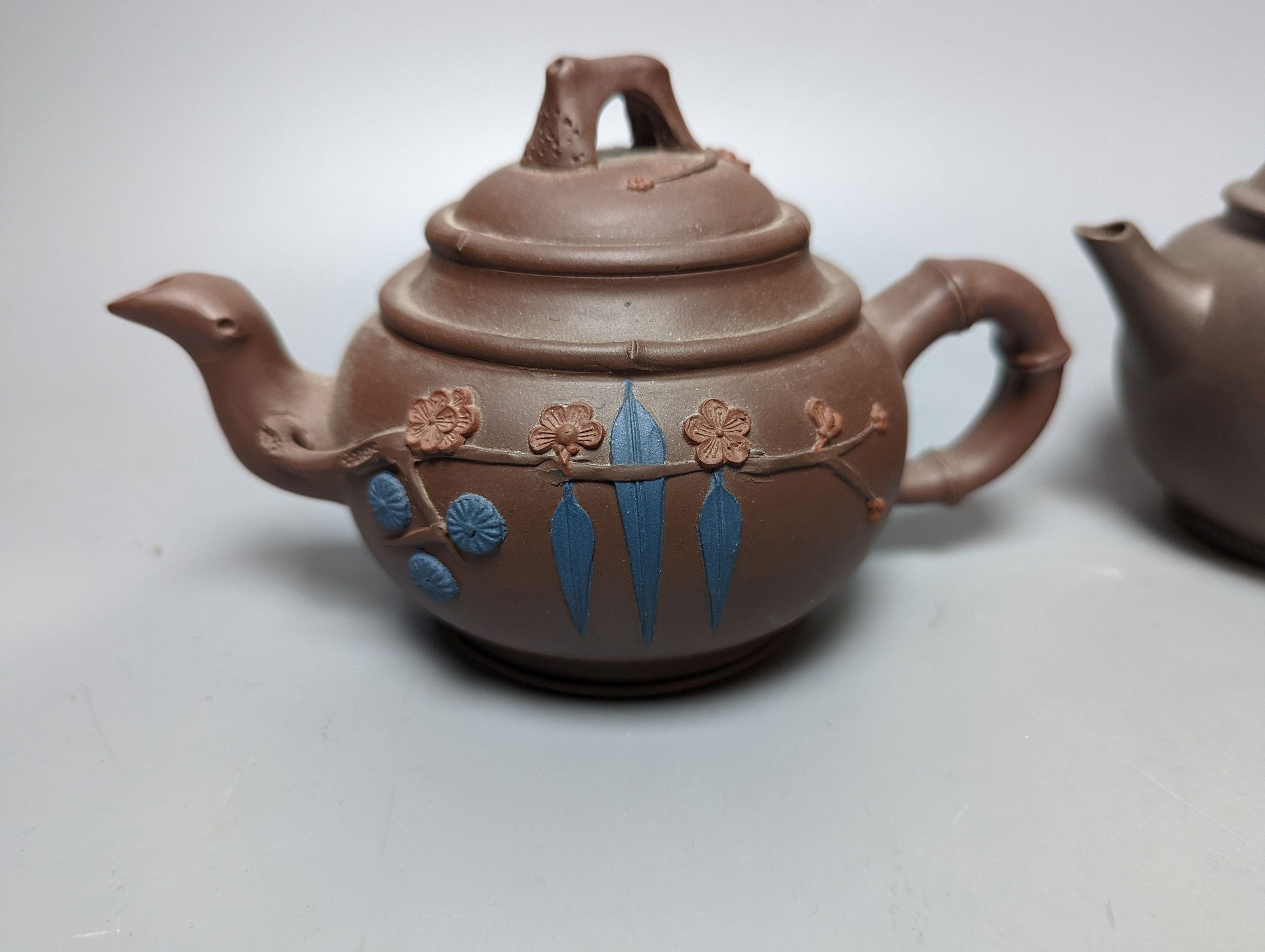 A Chinese stoneware 'cash' teapot and cover and five Yixing teapots (6)